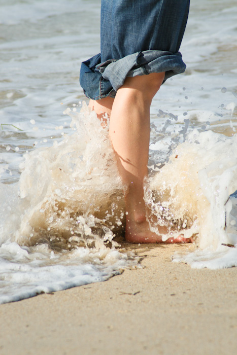 Feet in the surf.