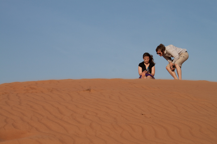 We stopped on a large dune to take photos. Everyone else in the truck (except for the driver) knew each other through mutual friends. It's a pity I can't remember any of their names, though I did email them these photos afterward. These two were teaching in Korea (I think) and were stopping in Dubai for a few days on their way back to the UK.