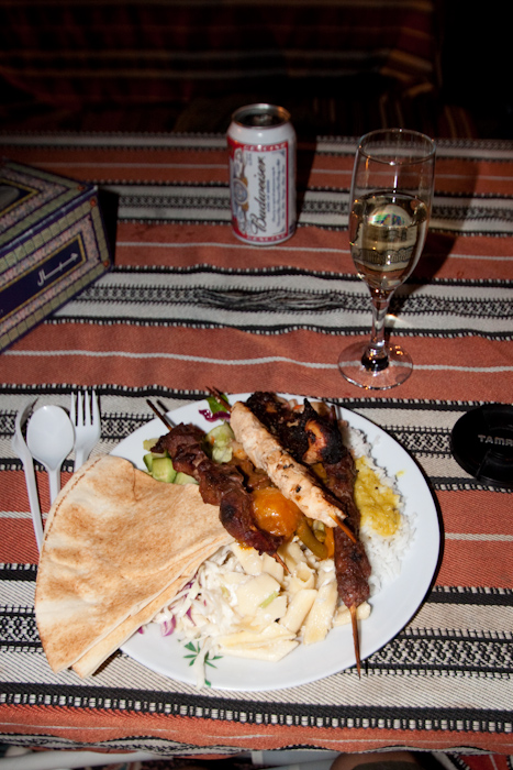 The dinner was a buffet. The queue had already grown to about a hundred people, but as we walked over one of the servers said