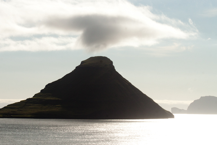 Not a volcano, just a hill creating its own cloud top.