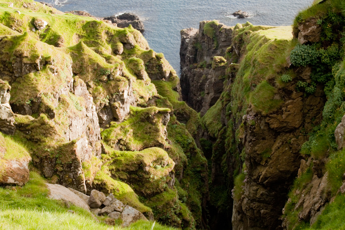 A deep gorge leading to the sea. I got a video of me juggling in front of this.