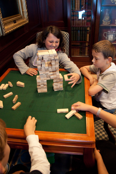 Kids on the ship playing their own version of Jenga.