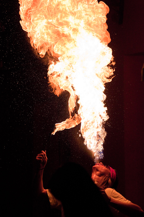 When I sat down to eat in, a fire breather started performing across the street. I've never taken photos of fire breathing before, and I didn't leave my table…