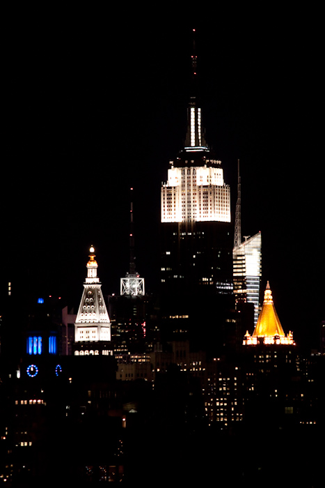 After juggling at the Pratt Institute juggling meeting, I took the Manhattan Bridge to Manhattan and back. It is the worst ever place for taking photos at night. There is loads of netting on the walkways on both sides, and every time a train or truck goes past, the entire structure wobbles, which makes using a tripod just as useless as not.