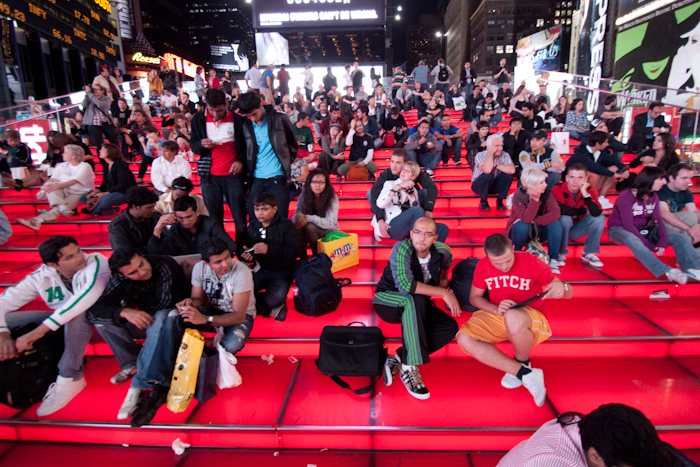 I took the subway back up to Times Square to get some video of me juggling in front of the video screens and signs. I'll share that video at some point. Here's a stepped viewing platform, so tourists can get a better view of the advertising.